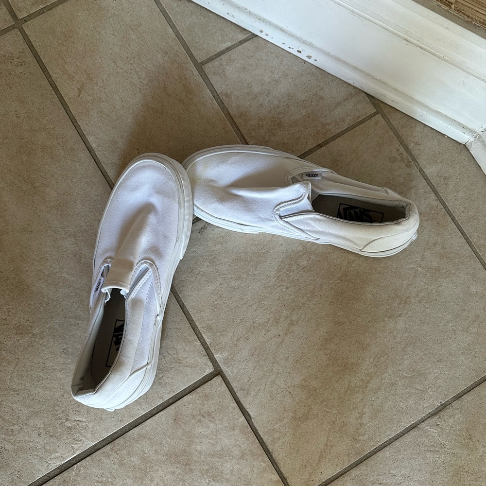 white slip on vans